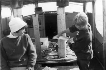 Joan with Jim, Walter Reed's charter boat, off Chincoteague, MD.